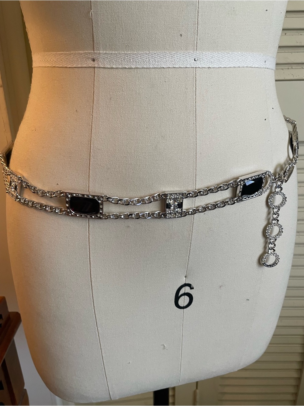 St John’s silver toned belt